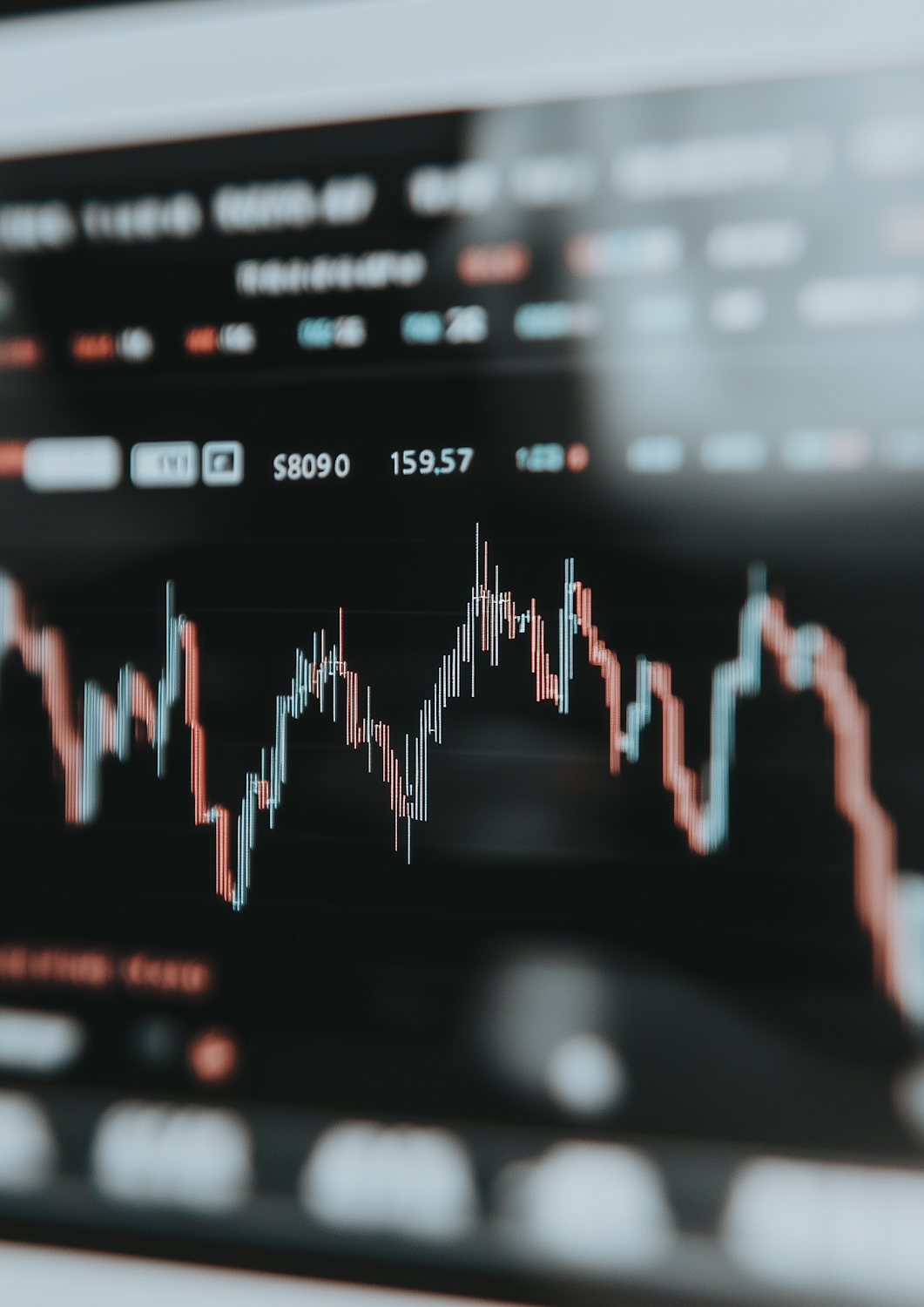 A person observes a highly volatile cryptocurrency chart, reflecting the rapid price changes in digital markets.